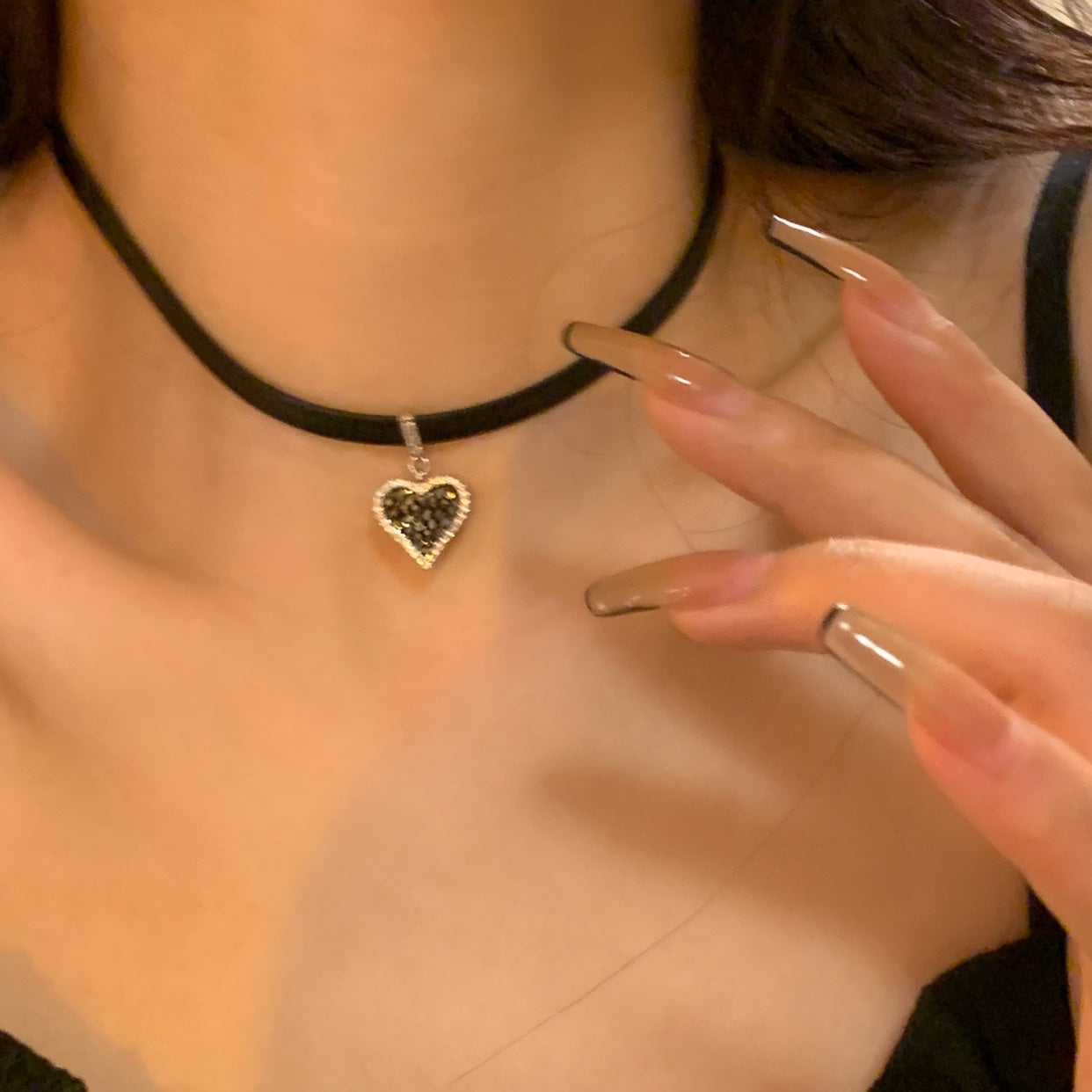 Black heart earrings with sparkling diamonds