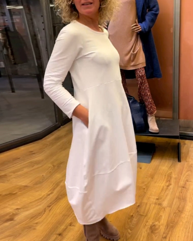 Clara | Elegant midi dress with practical pockets