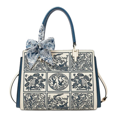 sylvia™ – unique crossbody with embroidery and bow detail