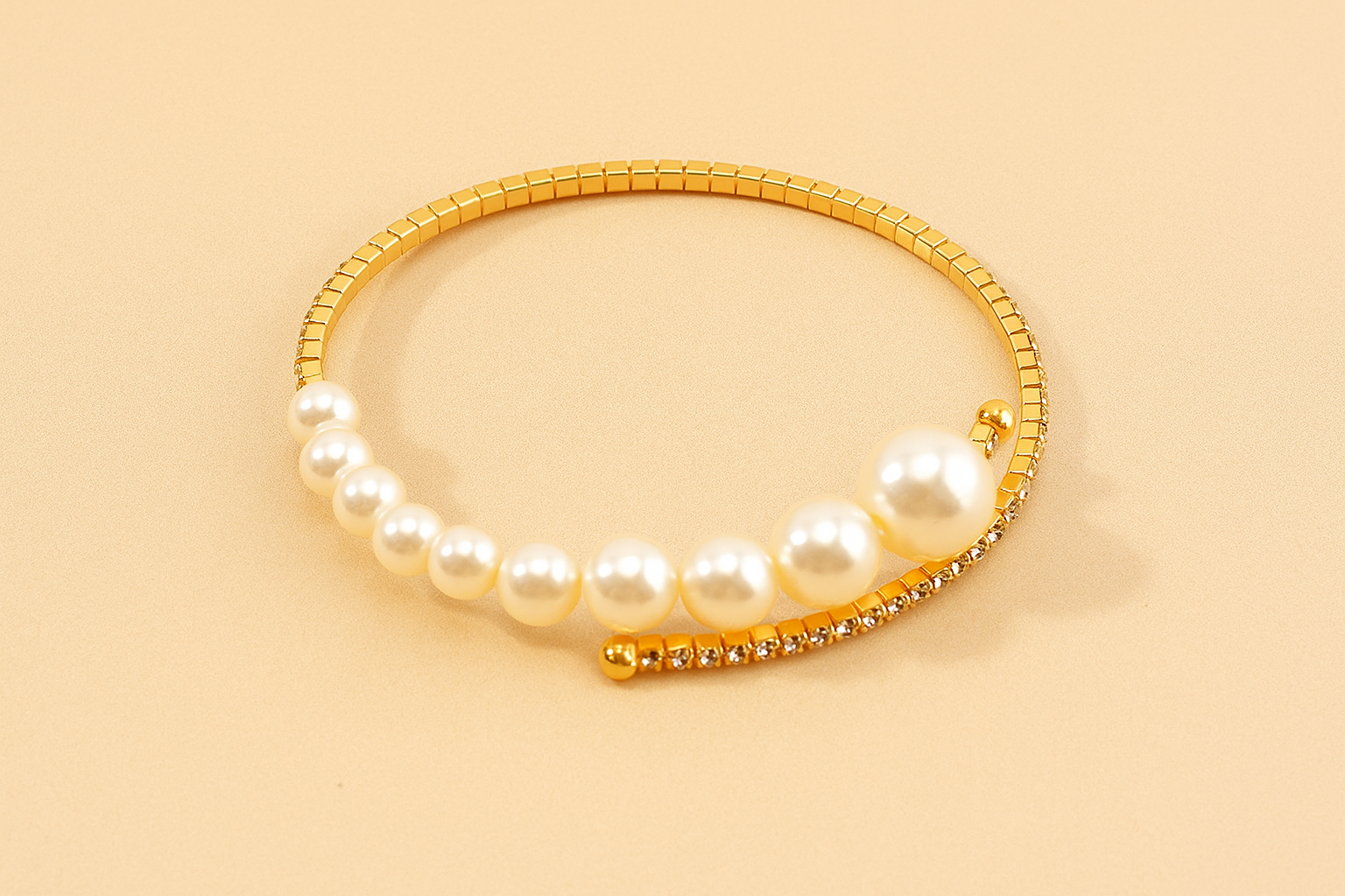 Elegant rhinestone bracelet with pearl details