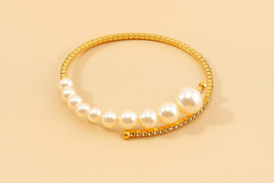 Elegant rhinestone bracelet with pearl details