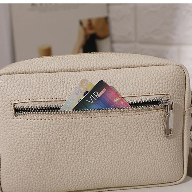 nora™ – practical cream-colored everyday bag