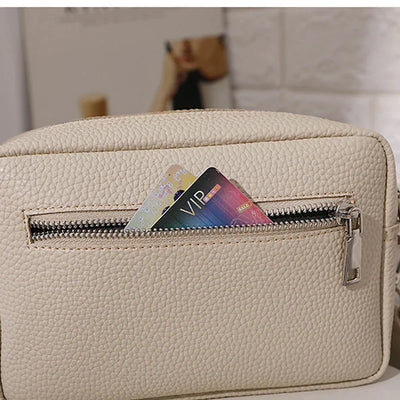 nora™ – practical cream-colored everyday bag