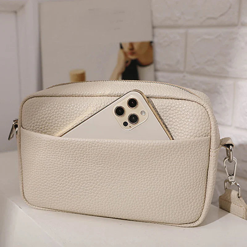nora™ – practical cream-colored everyday bag