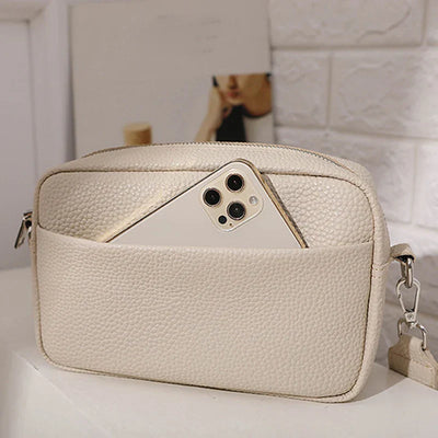 nora™ – practical cream-colored everyday bag