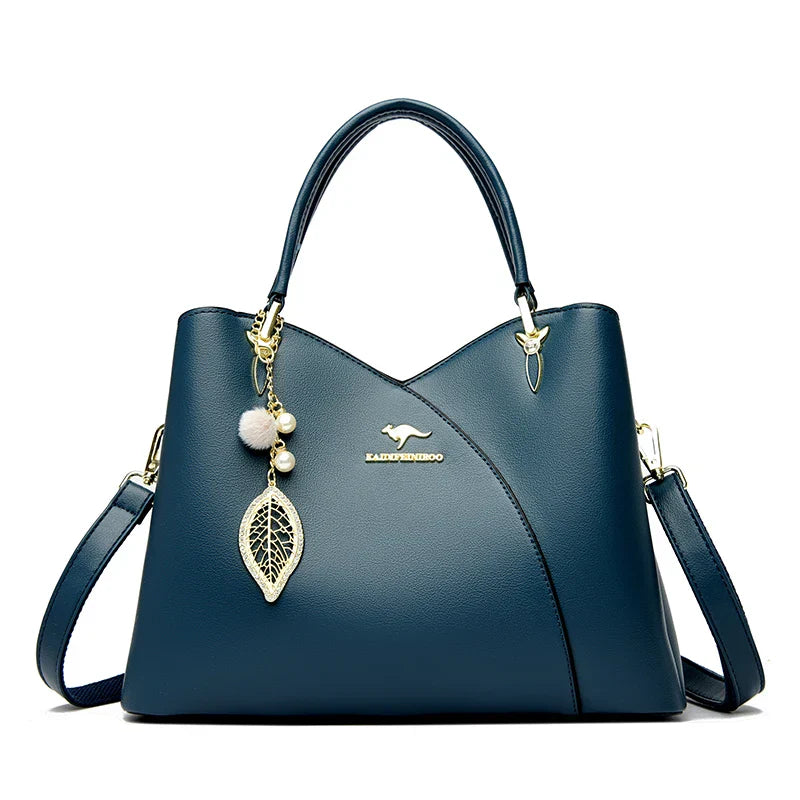 felina™ – black shoulder bag with elegant pendants