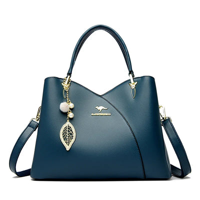 felina™ – black shoulder bag with elegant pendants