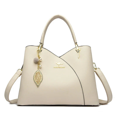 felina™ – black shoulder bag with elegant pendants