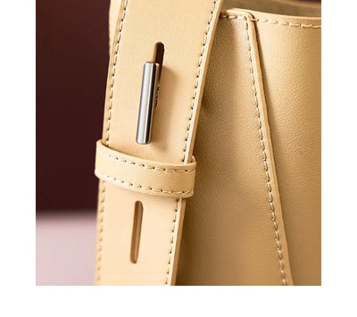 tine™ – elegant sand-colored shoulder bag with belt handle
