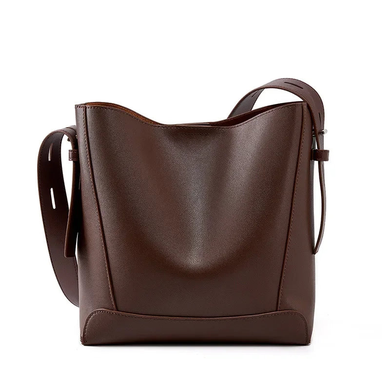 tine™ – elegant sand-colored shoulder bag with belt handle
