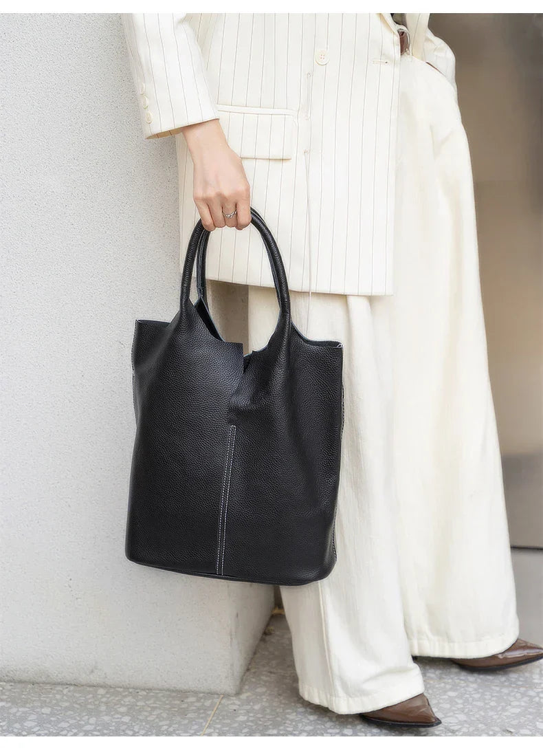 saga™ – light blue bucket bag in luxury leather look