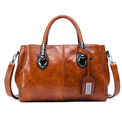 Pia™ | Elegant leather bag with braided handles