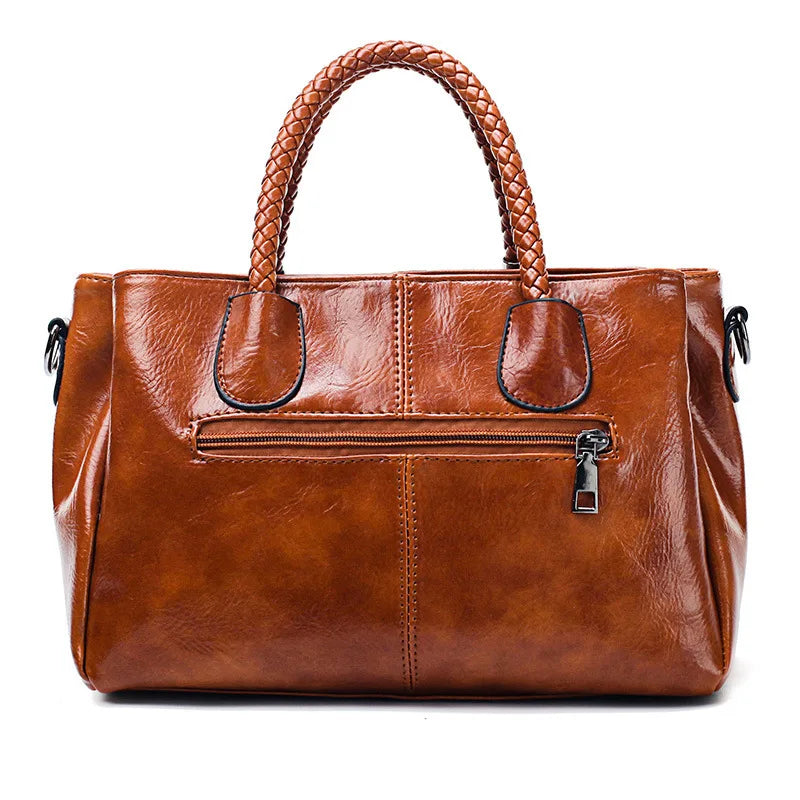 Pia™ | Elegant leather bag with braided handles