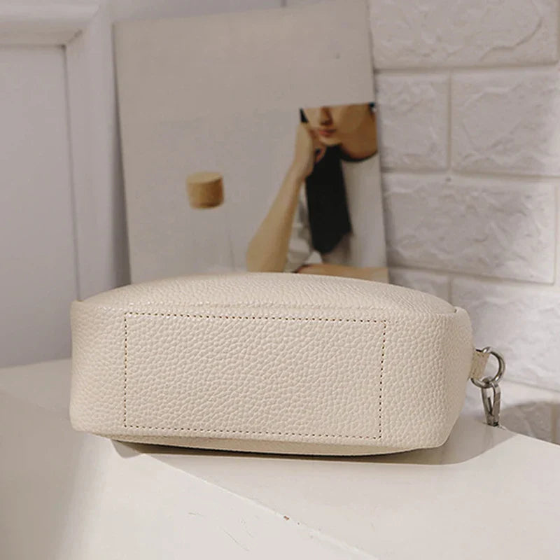 nora™ – practical cream-colored everyday bag