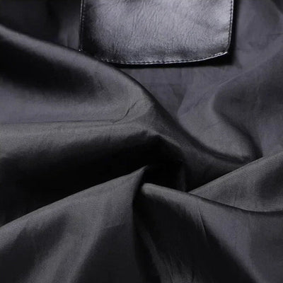 André™ Noir – Black leather jacket with wide collar and defined waist