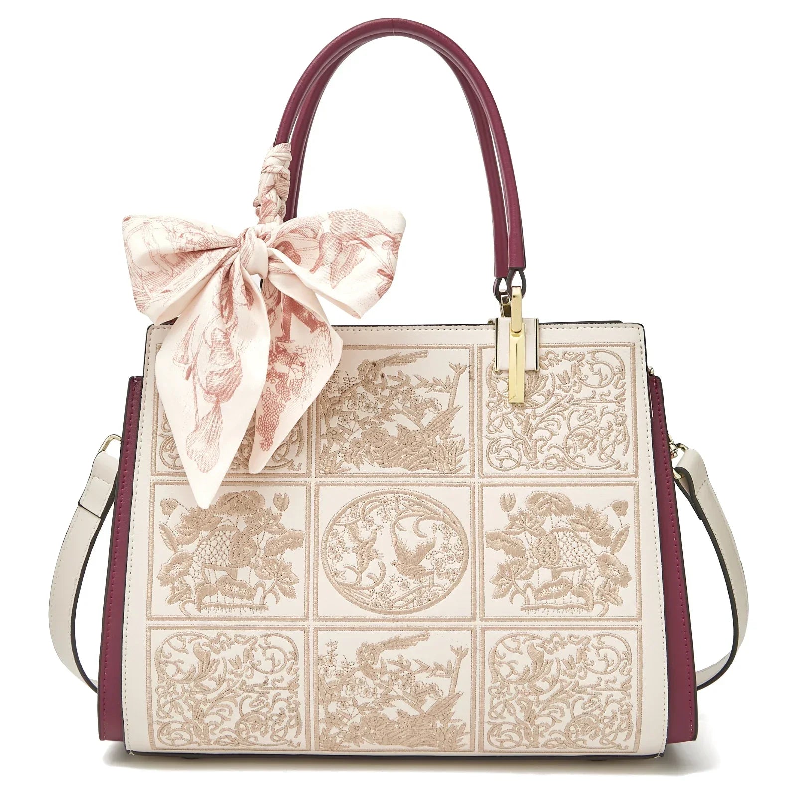 sylvia™ – unique crossbody with embroidery and bow detail