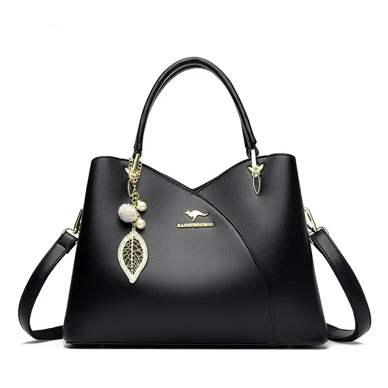 felina™ – black shoulder bag with elegant pendants
