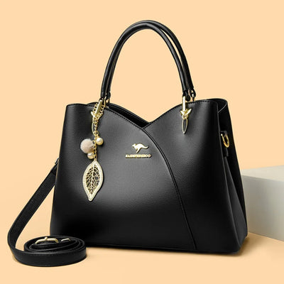felina™ – black shoulder bag with elegant pendants