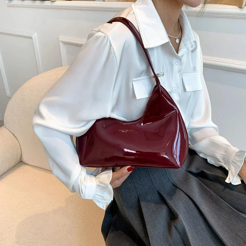 vera™ – glossy burgundy shoulder bag in patent look