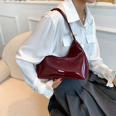 vera™ – glossy burgundy shoulder bag in patent look