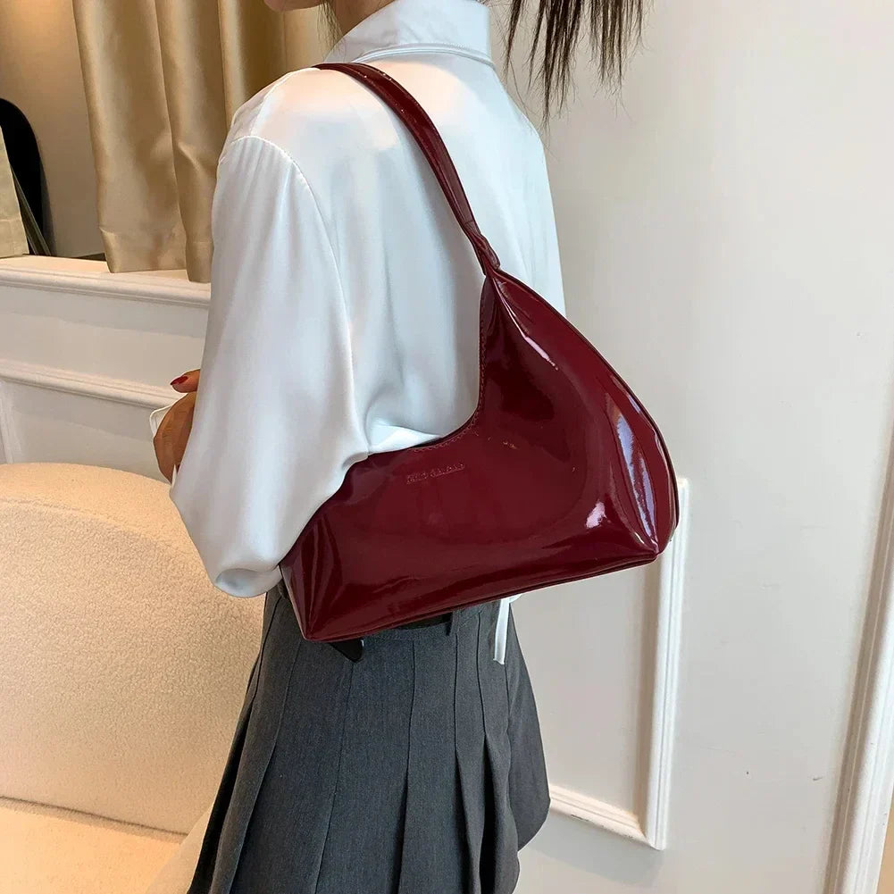 vera™ – glossy burgundy shoulder bag in patent look