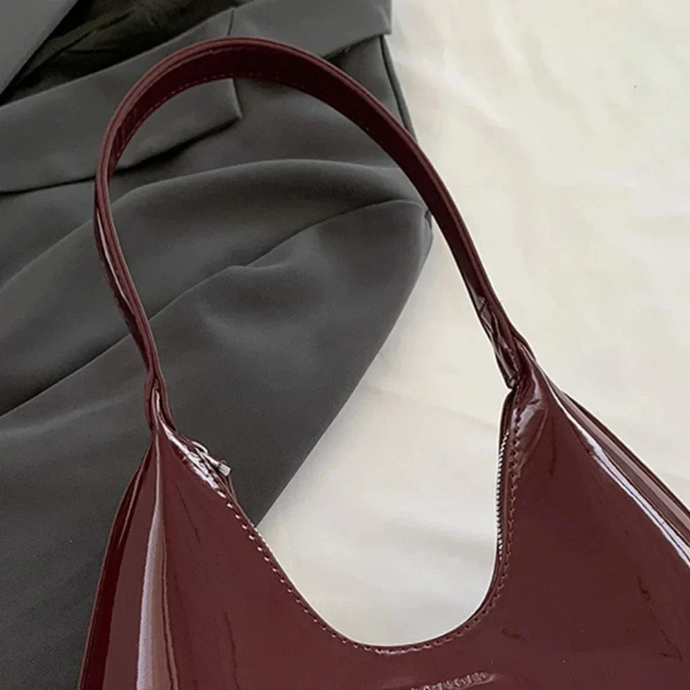 vera™ – glossy burgundy shoulder bag in patent look