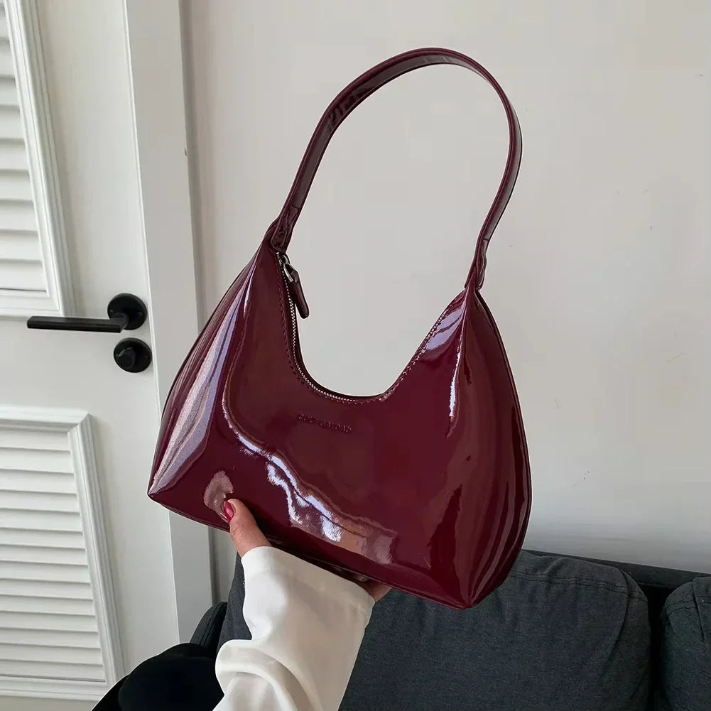 vera™ – glossy burgundy shoulder bag in patent look