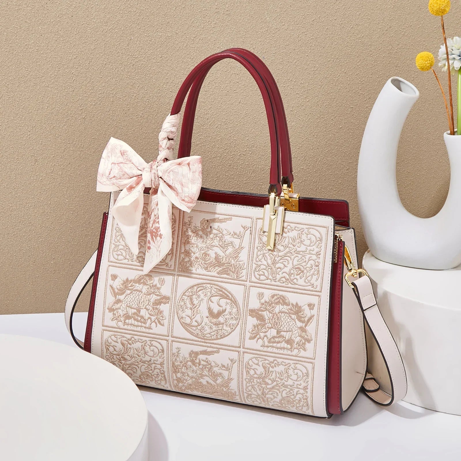 sylvia™ – unique crossbody with embroidery and bow detail