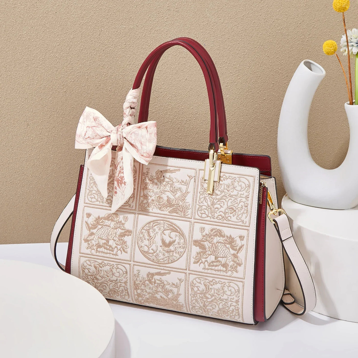 sylvia™ – unique crossbody with embroidery and bow detail