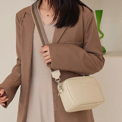 nora™ – practical cream-colored everyday bag