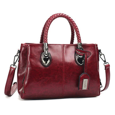 Pia™ | Elegant leather bag with braided handles
