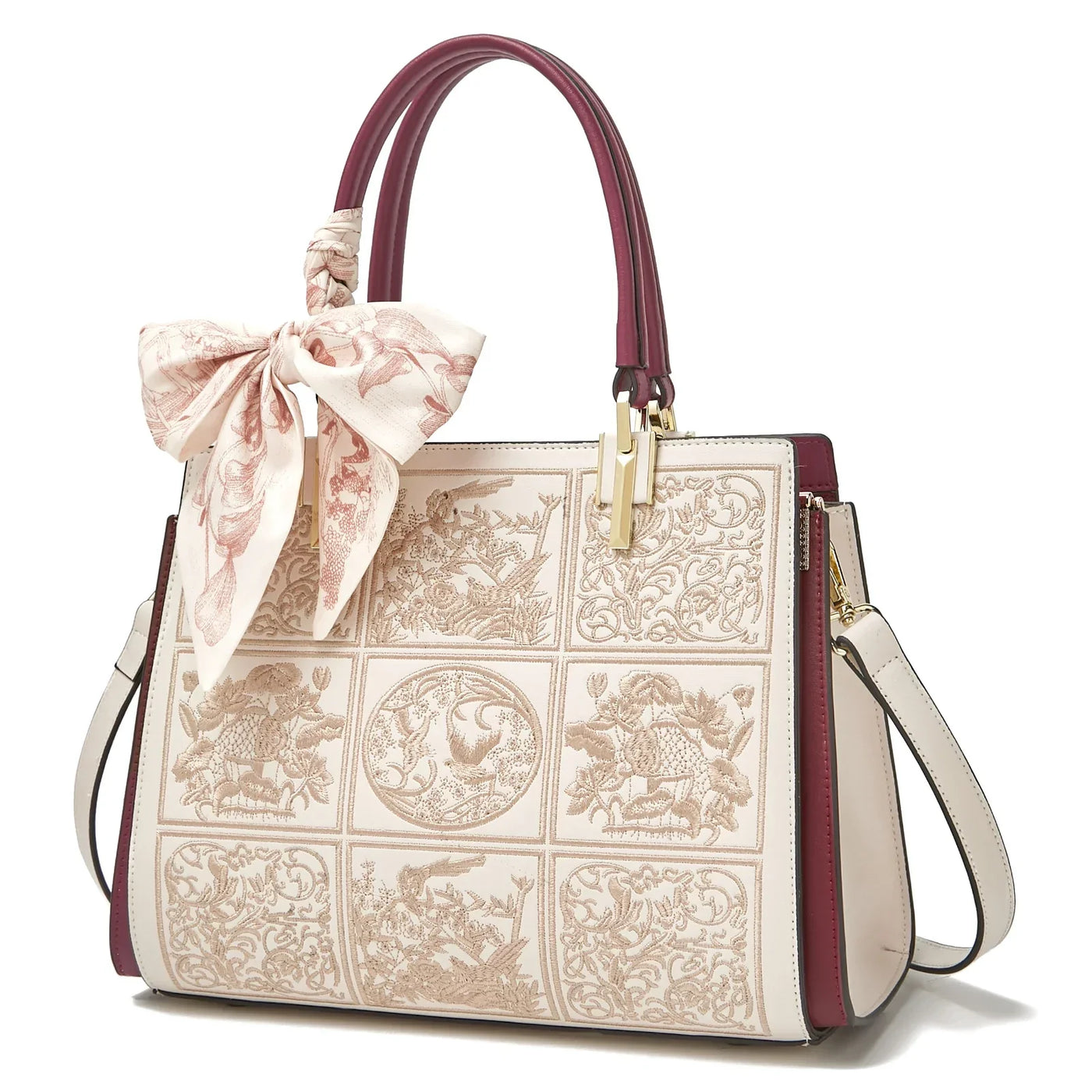 sylvia™ – unique crossbody with embroidery and bow detail