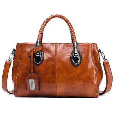 Pia™ | Elegant leather bag with braided handles