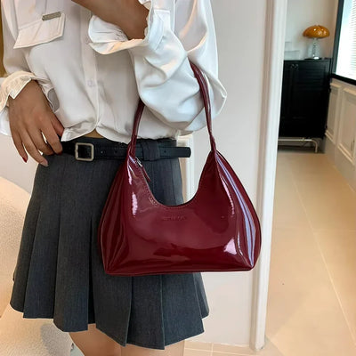 vera™ – glossy burgundy shoulder bag in patent look