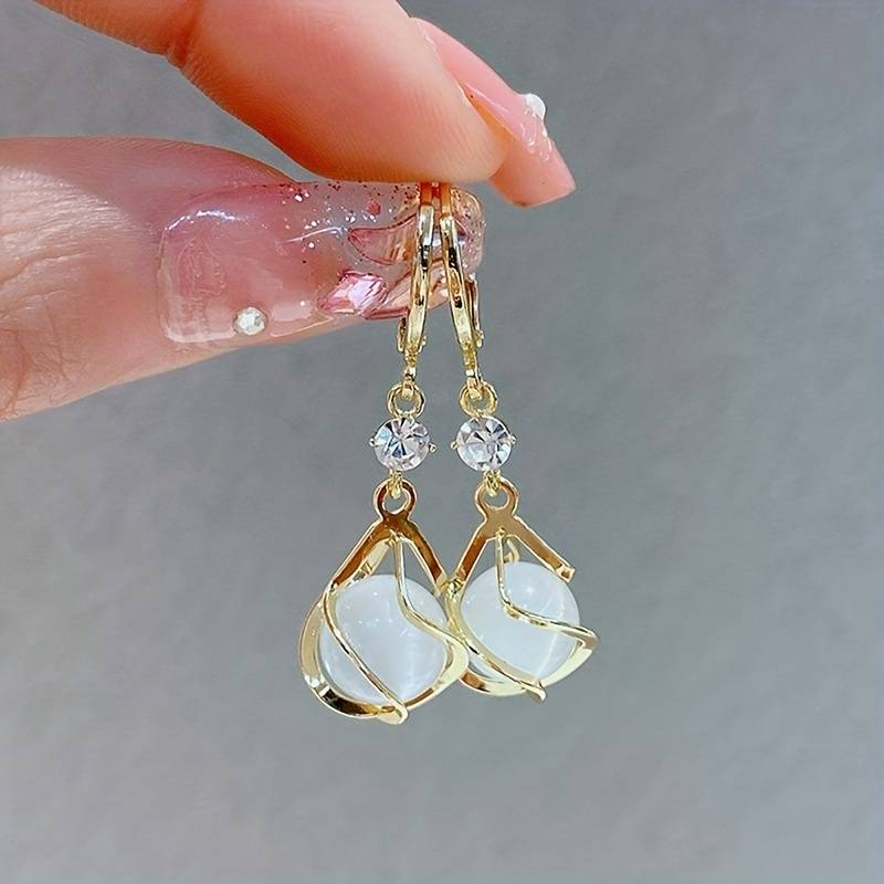 Vintage Hanging Earrings in Gold with White Opal